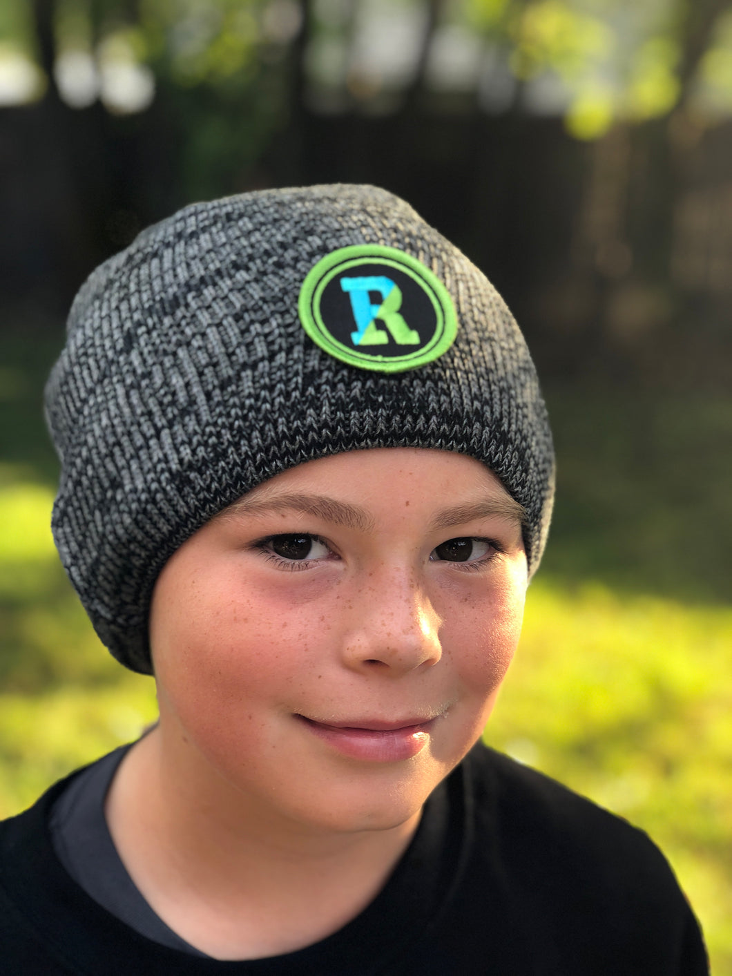 Black and white marled beanie with Rockland patch